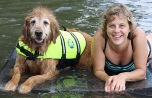 golden retriever dog and foster mom